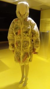 Raincoat with pockets for litter. The Japanese House