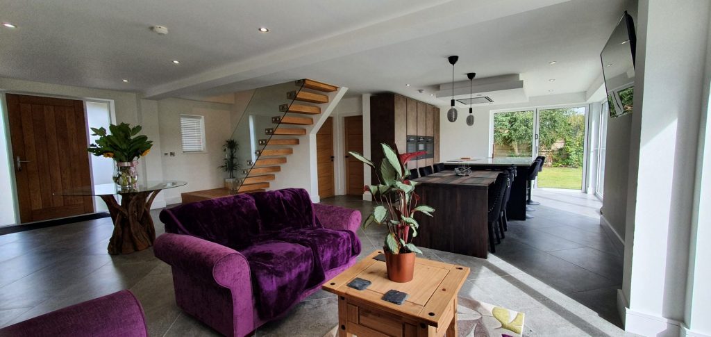 Interior view of multi purpose cooking dining and living space in new house