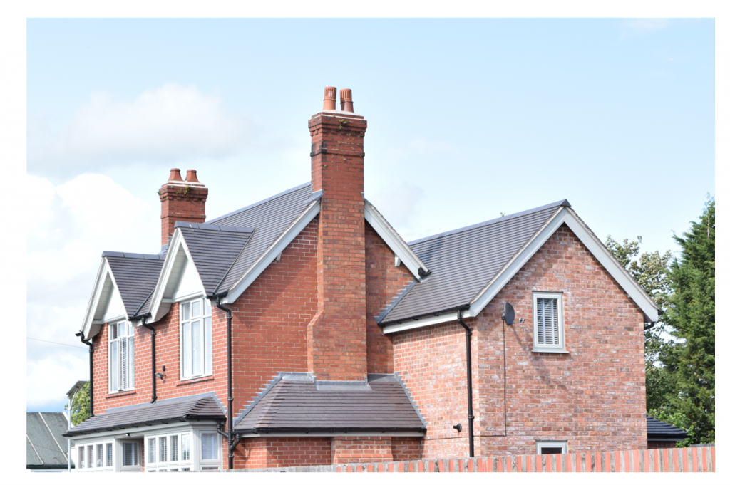 View of Sandbach Townhouse showing red brickwork and blue clay tiles